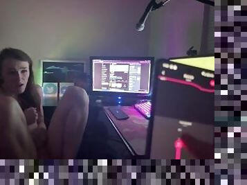 Gamer girl plays Overwatch while boyfriend uses her vibrator.