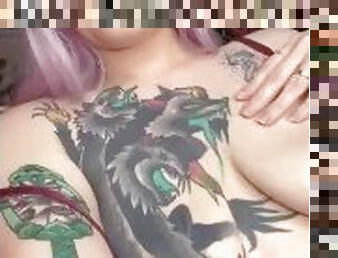 Tattooed clamped nipples