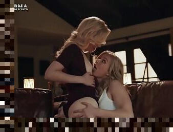 Two blondes make passionate love in the living room