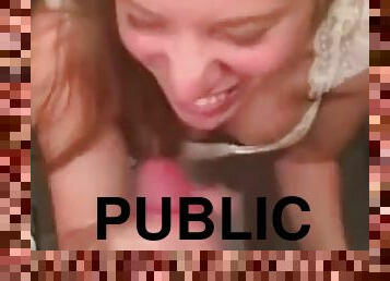 She sucks her boyfriend on her knees in a public toilet
