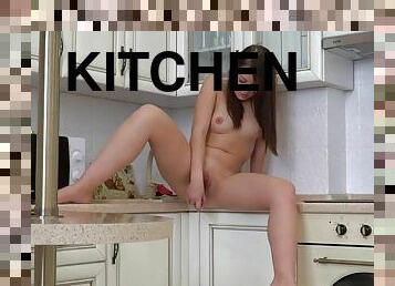 Solo pleasuring in the kitchen for the petite amateur teen