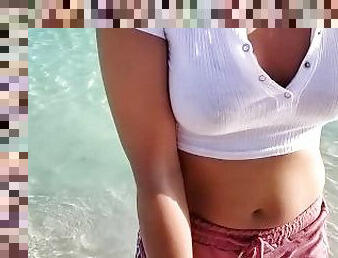 shows tits on the beach