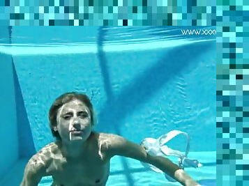 Hot American blonde Lindsay Cruz swims naked in the pool