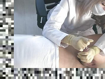 Teen doctor in a medical gown and gloves probing the urethra without lubrication