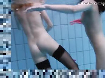 Andreika and Aneta swim naked in the pool