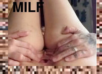 MILF plays with herself