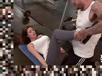 Hot brunette chick fucks her personal trainer in a gym
