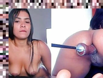 Ebony college girl enjoys putting a big dildo in her anus