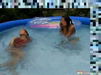 Two hot lesbians have some fun in the pool