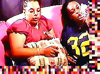 Chubby black chicks smoke on the couch