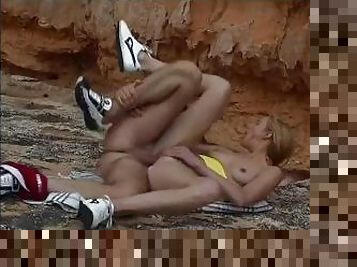 Petite MILF whore gets her veteran moist pussy fucked hard on the sand