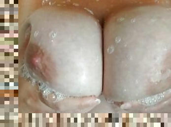 Milf plays with huge tits in shower, soapy, wet fun
