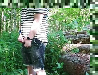 Relaxed emo guy pissing and jerks off in a forest and squirts his cum