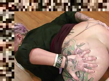 Inked beauty stretches her ass for the dick to go deeper than ever