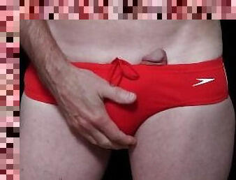 Playing with myself in a red speedo A