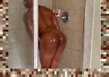 Chocolate muscle hunk takes a shower