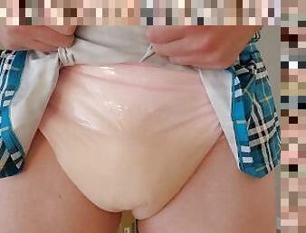 Sissy Schoolgurl in chastity pisses diaper