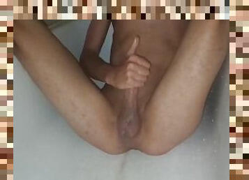 18 year old milking his cock in the bathroom