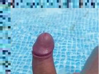 I masturbate my dick in the pool