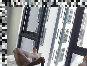 jerking off at the window