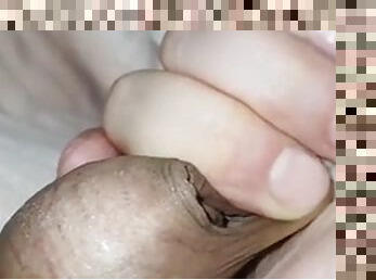 Stepsons cock gets a handjob from his horny stepmom in bed