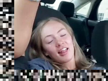 Slut with her feet in the car